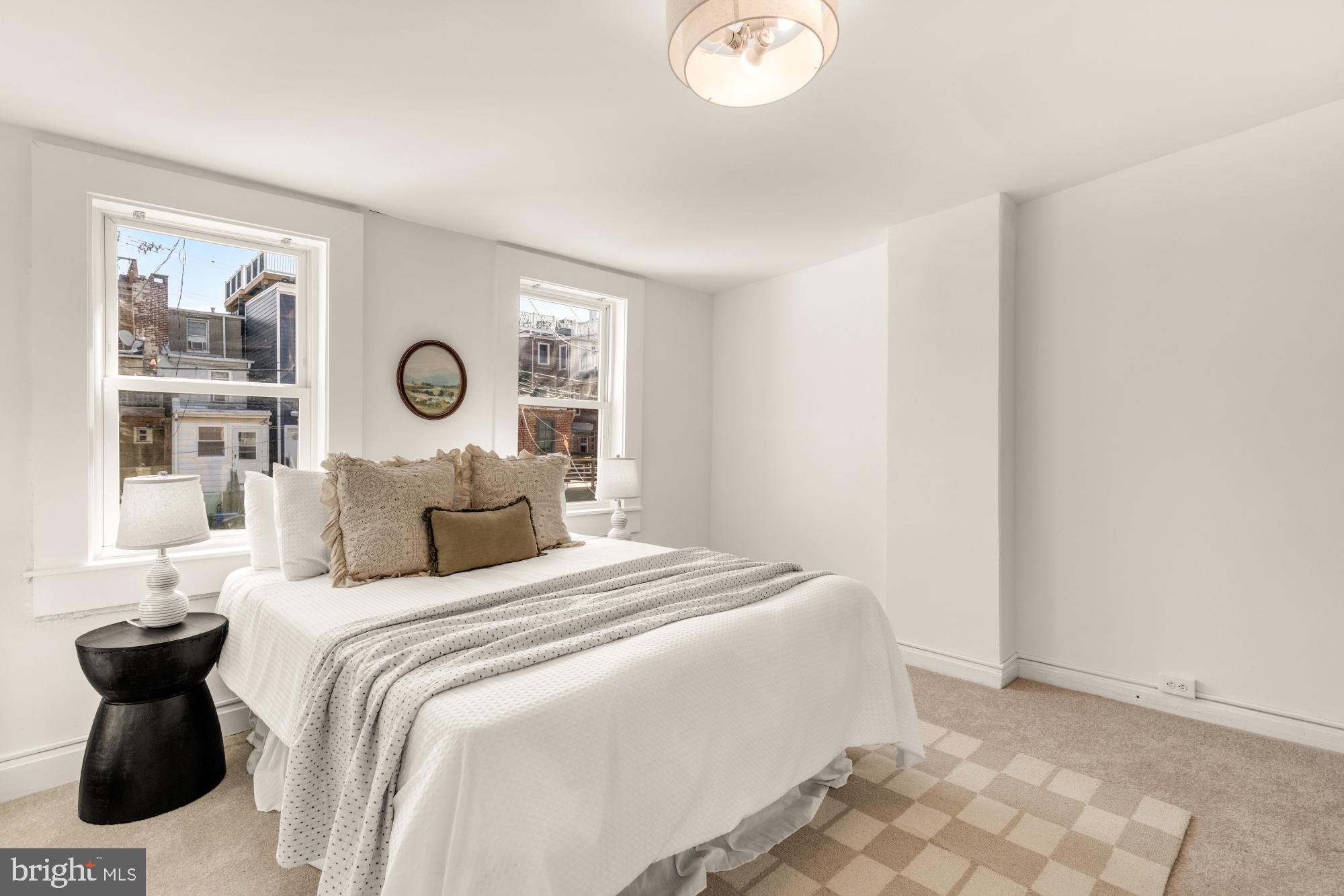 1213 Battery Avenue Baltimore, MD 21230 - Photo 22 of 39 a bedroom with a bed and window