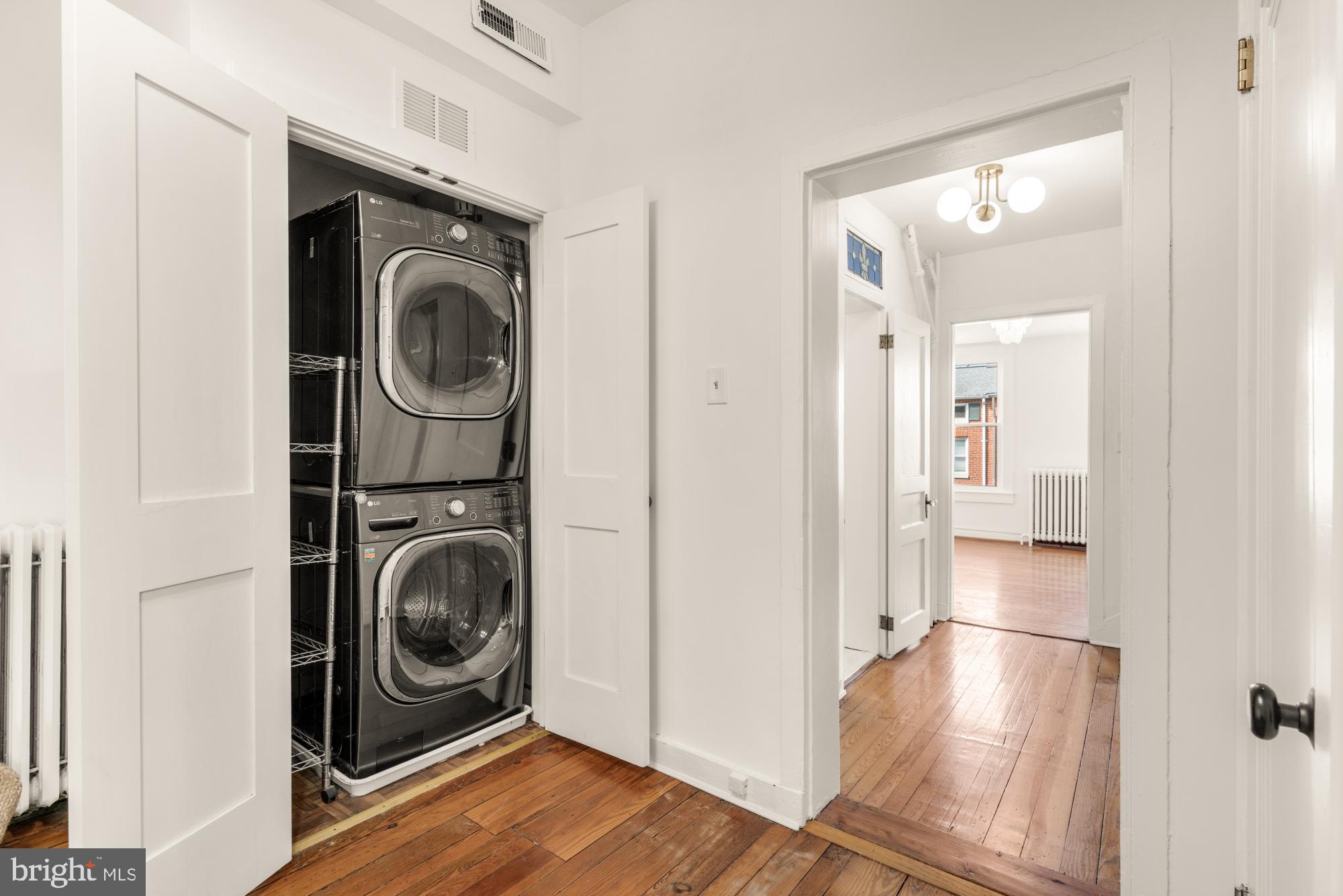 1213 Battery Avenue Baltimore, MD 21230 - Photo 23 of 39 a view of a hallway with washer and dryer