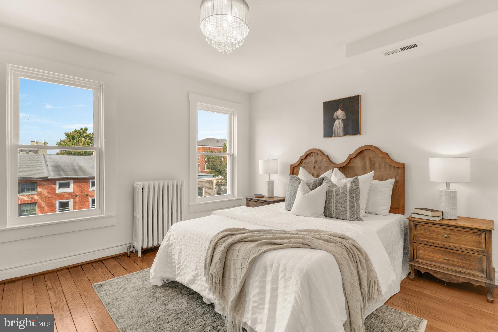 1213 Battery Avenue Baltimore, MD 21230 - Photo 29 of 39 a bedroom with a bed and a window