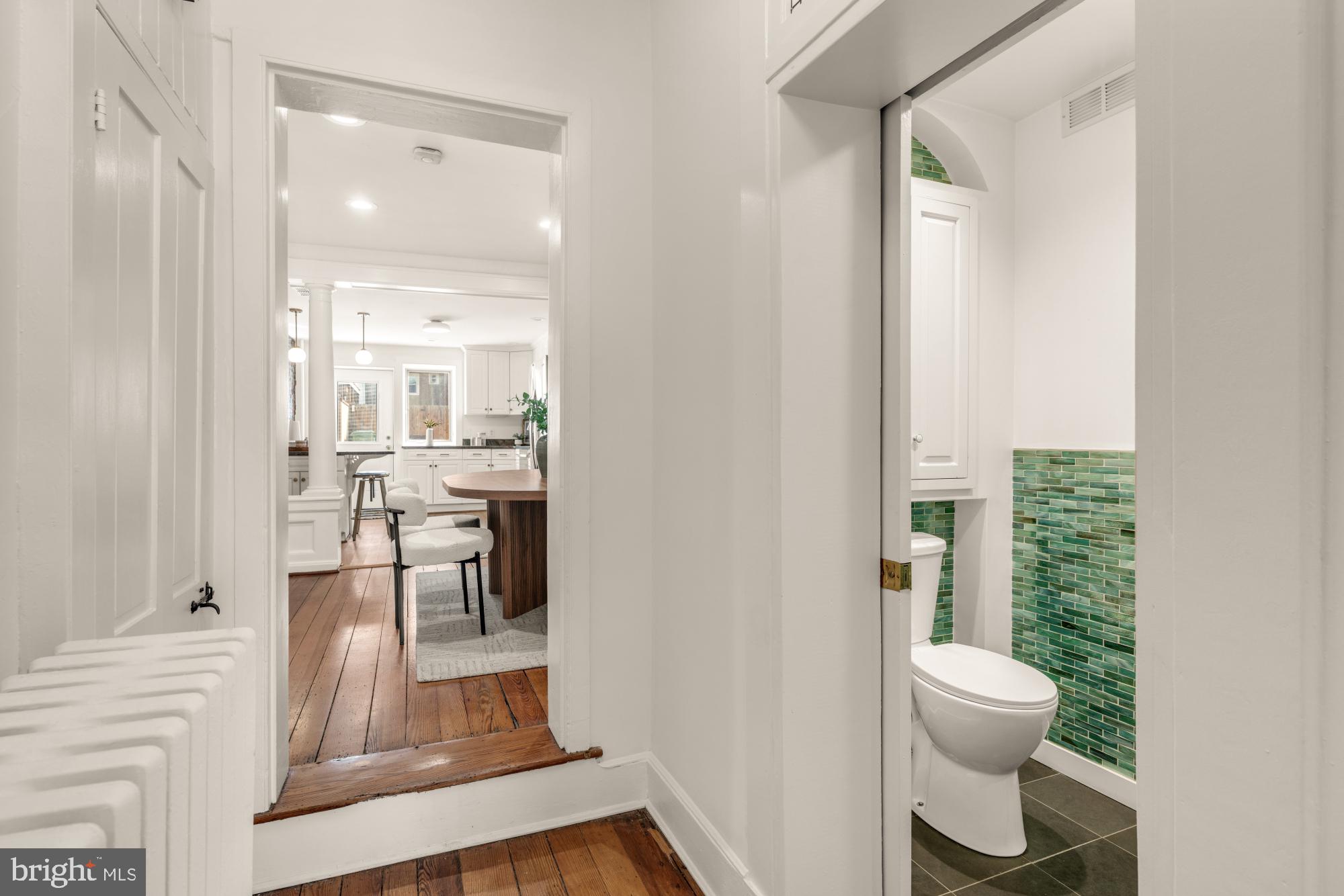1213 Battery Avenue Baltimore, MD 21230 - Photo 9 of 39 a bathroom with a sink and mirror