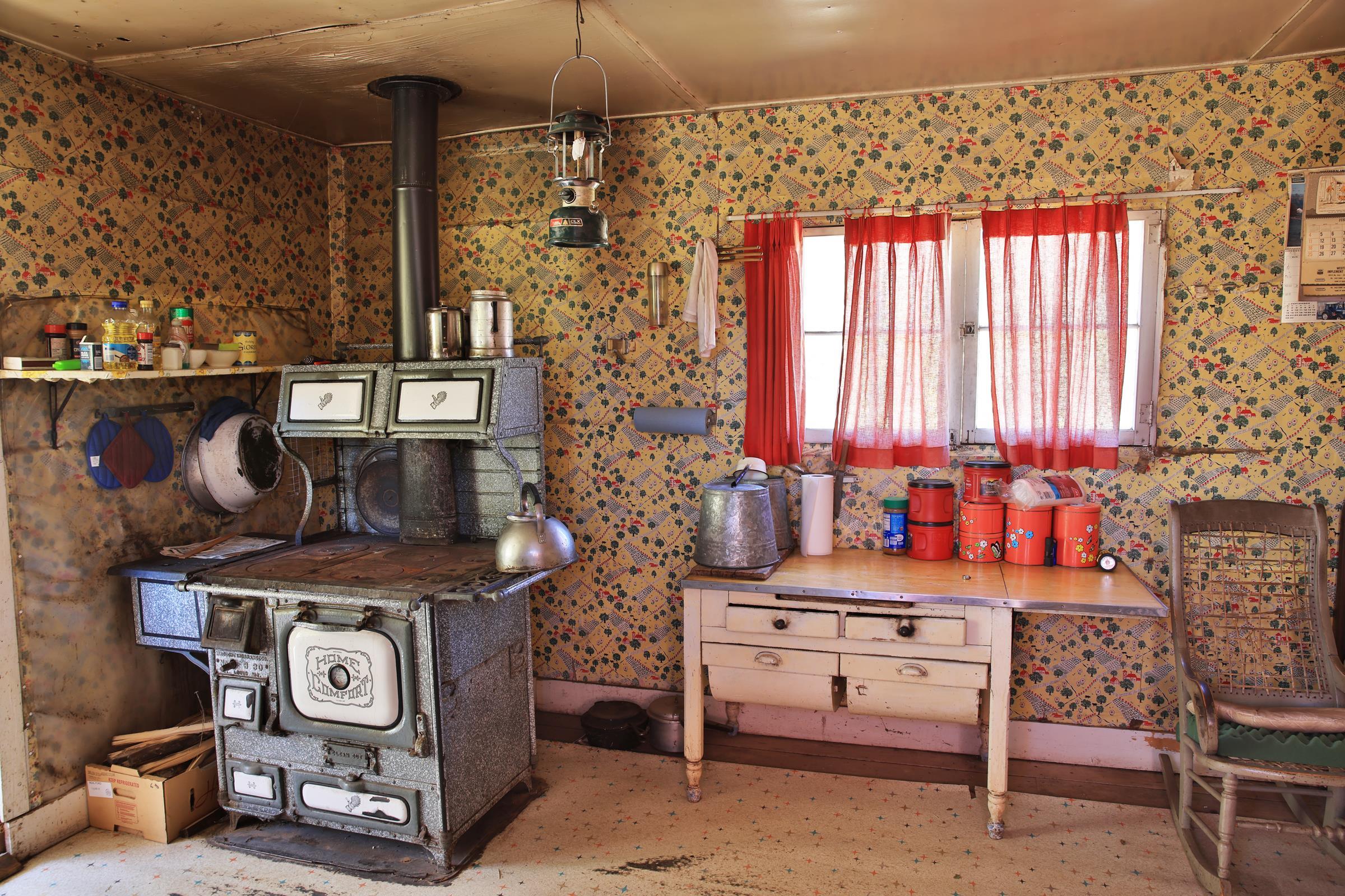 2586-26 26 1/10 Road Whitewater, CO 81527 - Photo 10 of 42 a room with chairs and a table with wooden floor