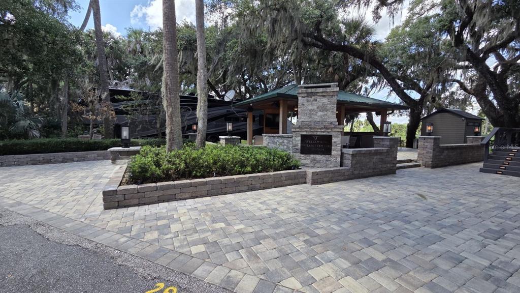 291 Bear Trail River Ranch, FL 33867 - Photo 5 of 23 a front view of a house with garden