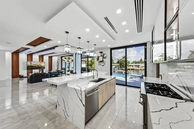 a bedroom with a large bed and a large window