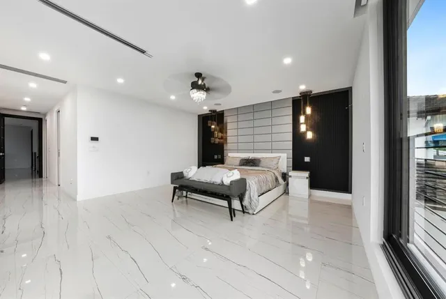 a view of a building with potted plants