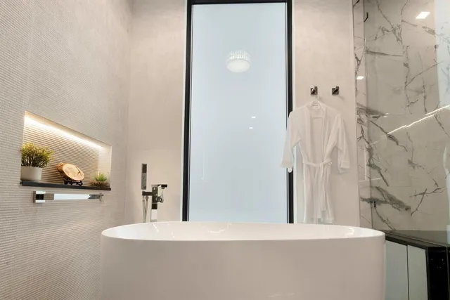 a swimming pool with outdoor seating yard and barbeque oven