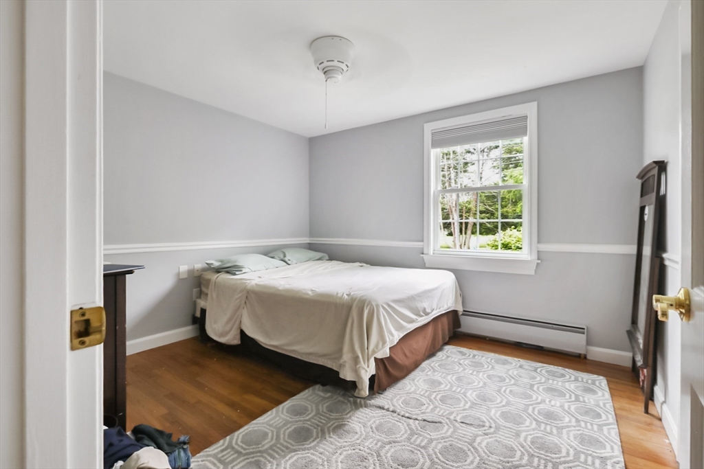 5 Fox Run Road Topsfield, MA 01983 - Photo 12 of 23 a bedroom with a bed and a window