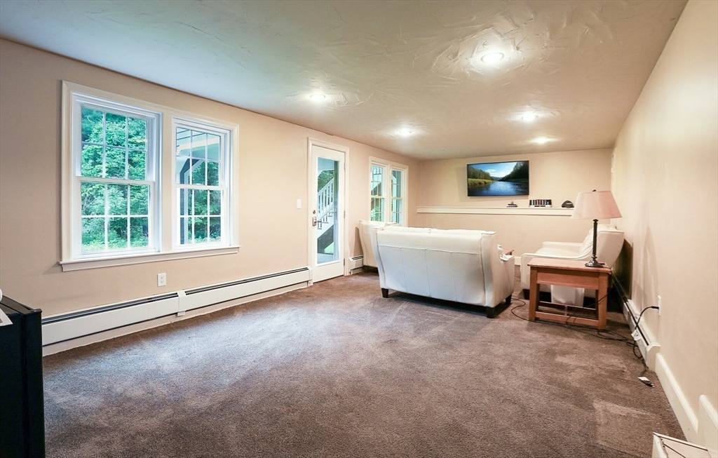 5 Fox Run Road Topsfield, MA 01983 - Photo 17 of 23 a spacious bedroom with a bed and a large window