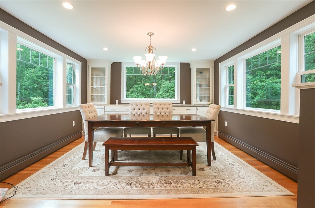 5 Fox Run Road Topsfield, MA 01983 - Photo 9 of 23 a view of a dining room with a table and chairs