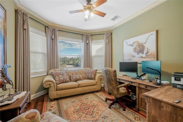 a view of chairs and table in the patio