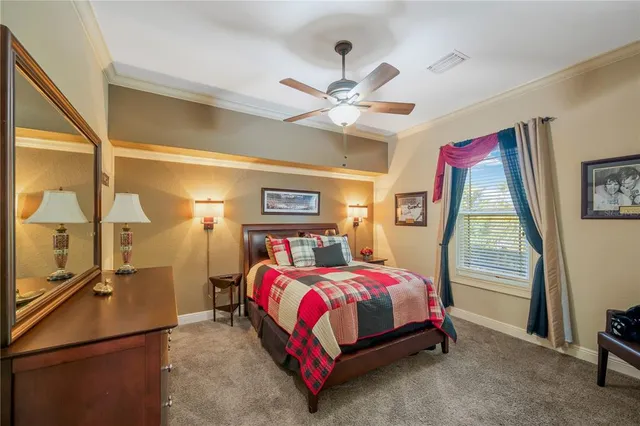 a view of a swimming pool with an outdoor space and seating area