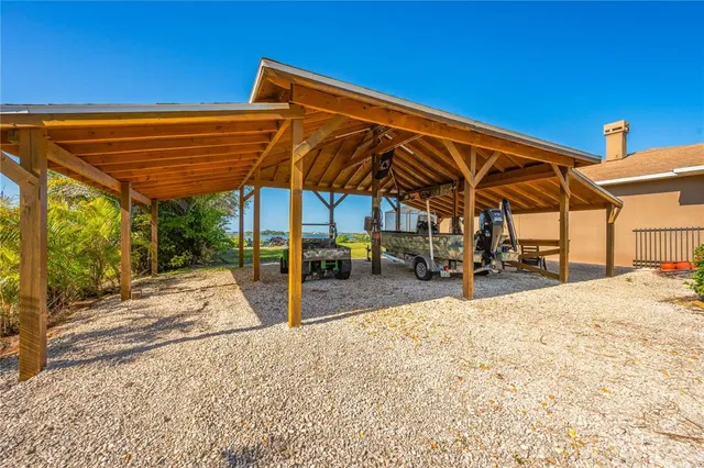 a living room with furniture a window and gym equipment