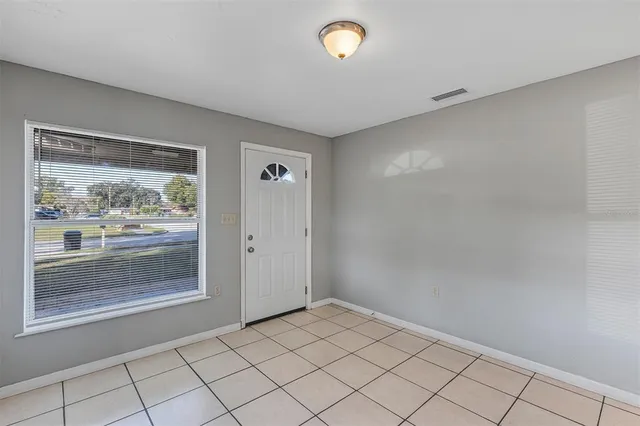 a view of an empty room with window