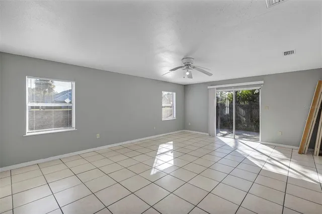 a view of an empty room and window