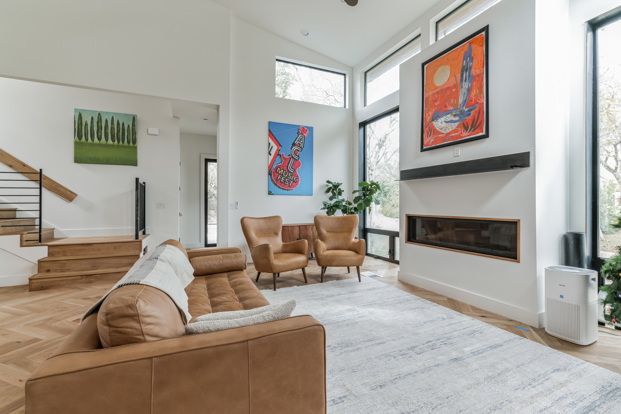 107 Blue Ridge Trail Austin, TX 78746 - Photo 12 of 29 a living room with furniture and a fireplace