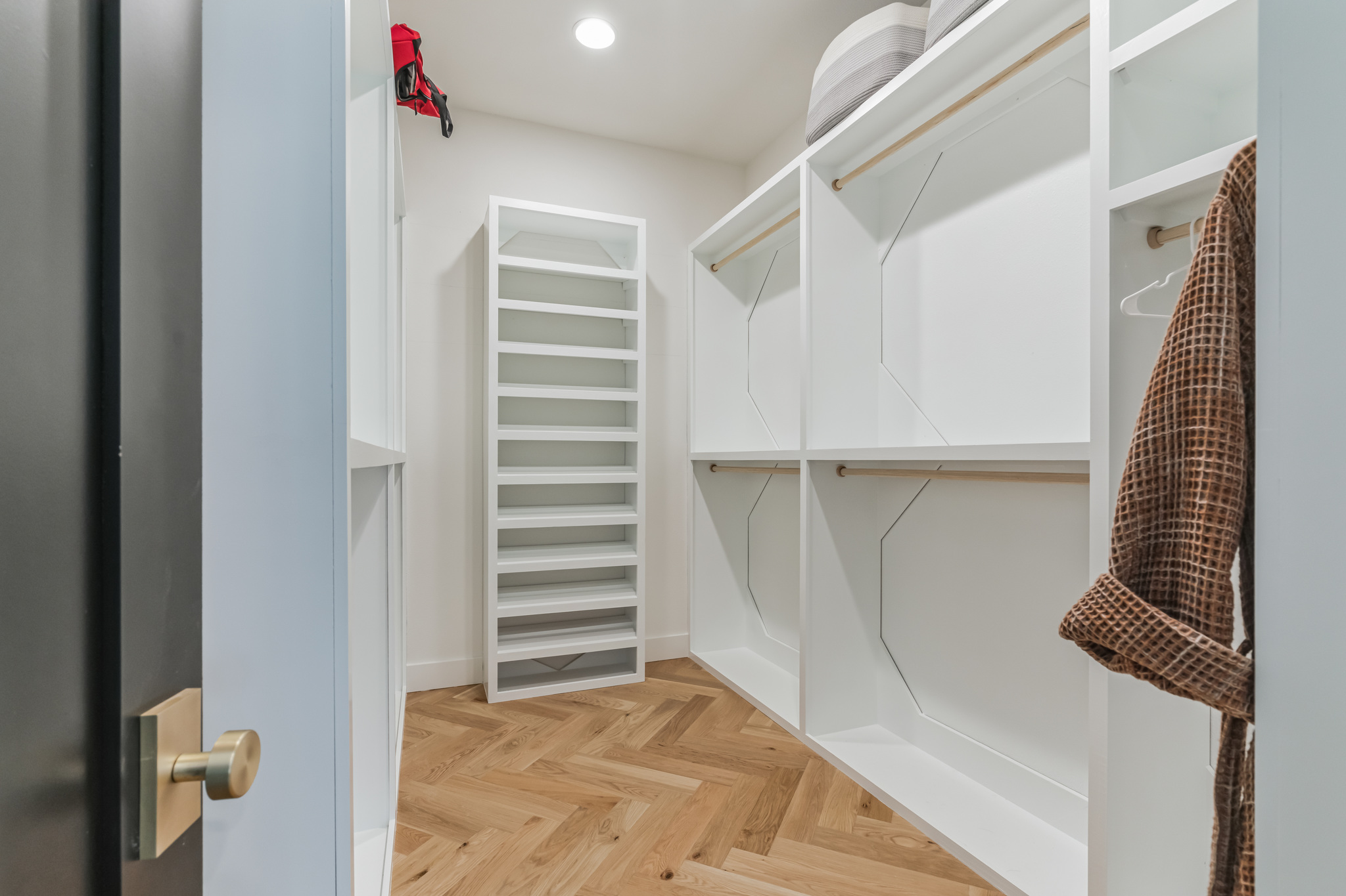 107 Blue Ridge Trail Austin, TX 78746 - Photo 18 of 29 a view of walk in closet with empty racks