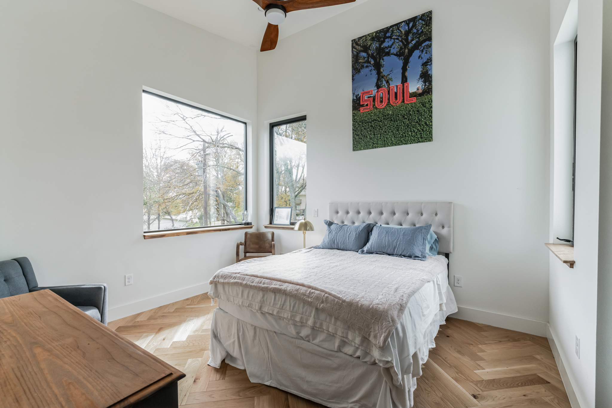 107 Blue Ridge Trail Austin, TX 78746 - Photo 20 of 29 a bedroom with a bed and a window