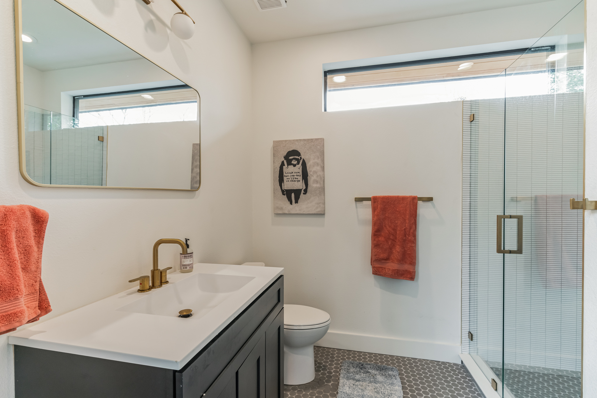 107 Blue Ridge Trail Austin, TX 78746 - Photo 25 of 29 a bathroom with a sink and a mirror
