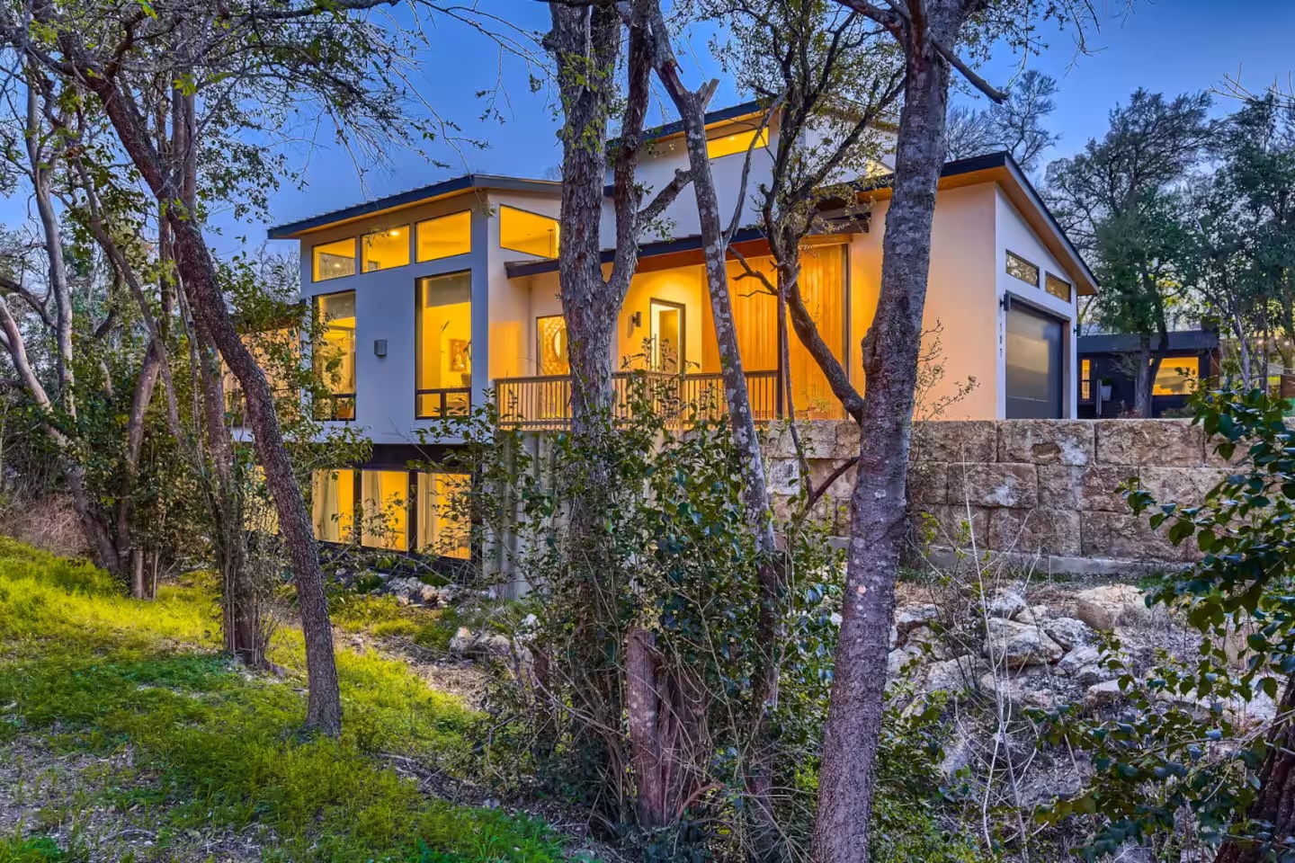 107 Blue Ridge Trail Austin, TX 78746 - Photo 26 of 29 a view of a house with a yard