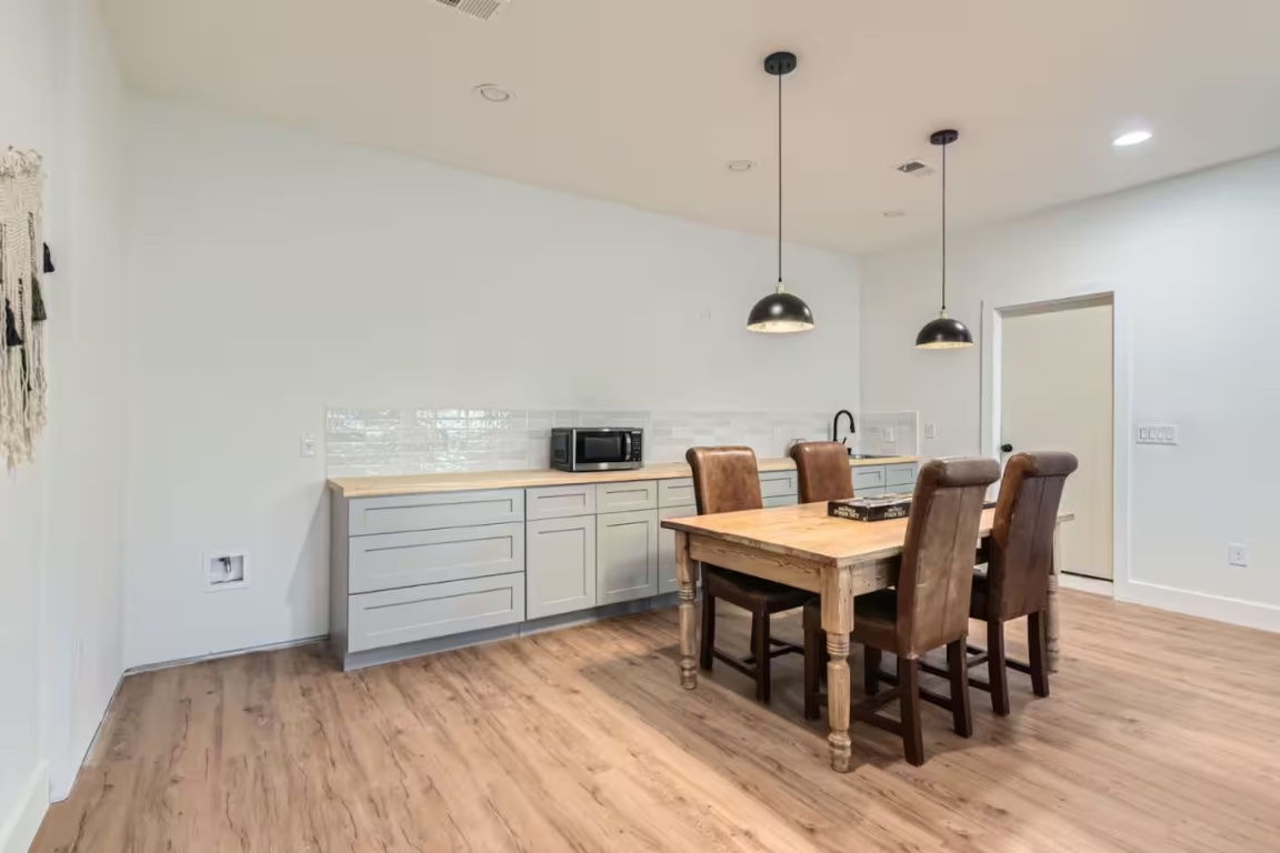 107 Blue Ridge Trail Austin, TX 78746 - Photo 31 of 38 Dining space with recessed lighting and light wood-style flooring