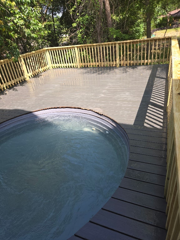 107 Blue Ridge Trail Austin, TX 78746 - Photo 34 of 38 View of pool with a hot tub and a deck
