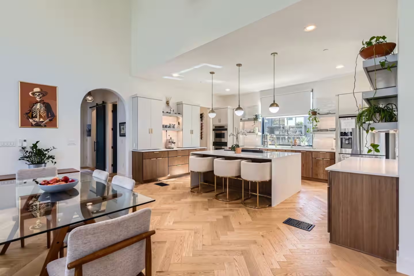 107 Blue Ridge Trail Austin, TX 78746 - Photo 5 of 29 a large kitchen with a table and chairs in it