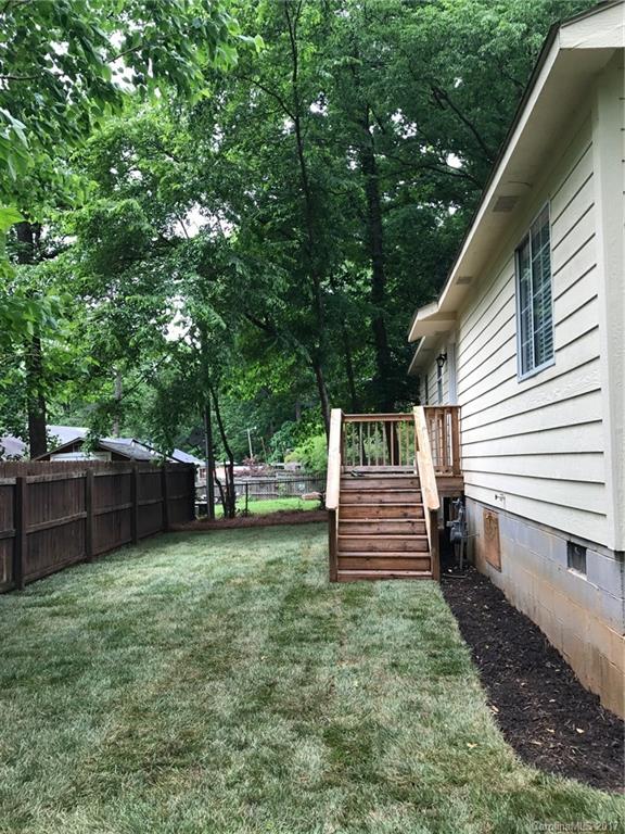 4200 Raney Way Charlotte, NC 28205 - Photo 12 of 12 a front view of a house with a garden