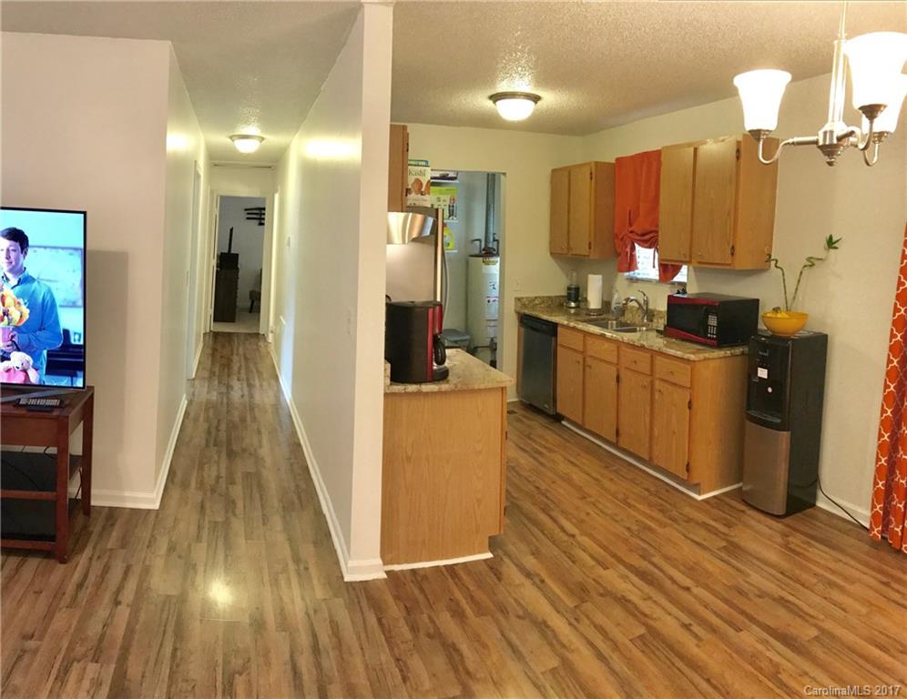 4200 Raney Way Charlotte, NC 28205 - Photo 3 of 12 a view of a kitchen from the hallway