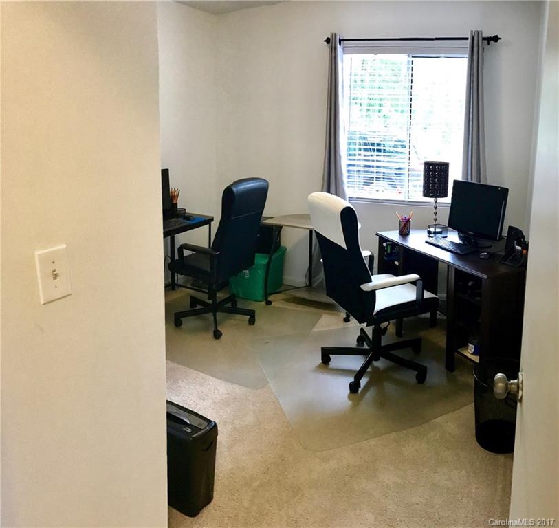 4200 Raney Way Charlotte, NC 28205 - Photo 7 of 12 a view of a workspace with furniture and a window