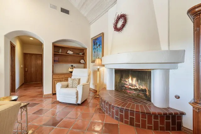 a view of a house with sitting area and furniture