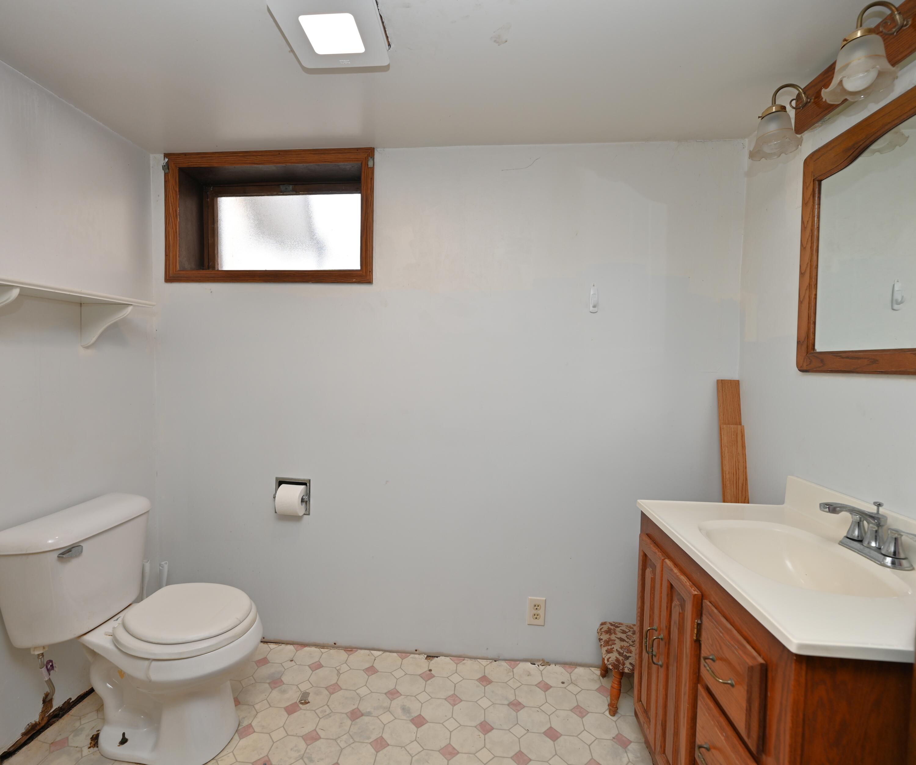 5110 West 400 North Winamac, IN 46996 - Photo 34 of 35 a bathroom with a sink toilet and vanity