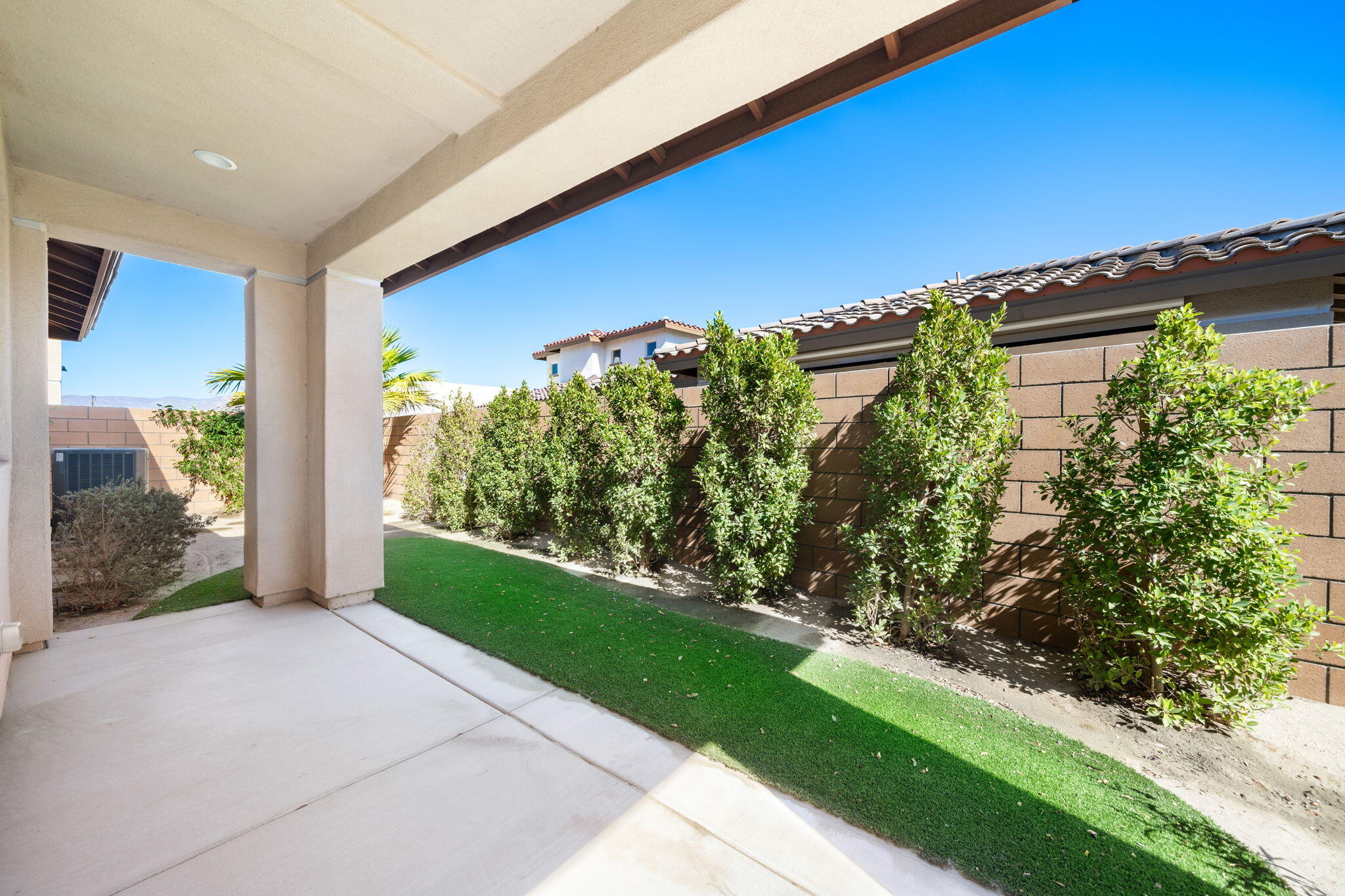 74338 Millennia Way Palm Desert, CA 92211 - Photo 26 of 33 a view of a garden with an outdoor space