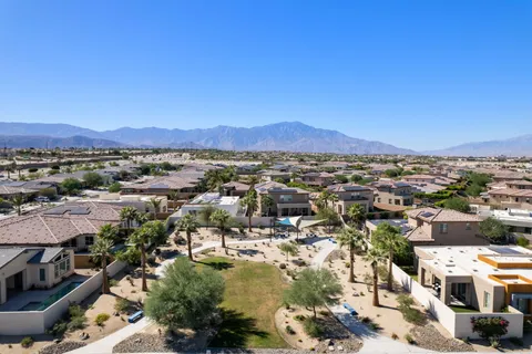 a view of a city with mountains in the background