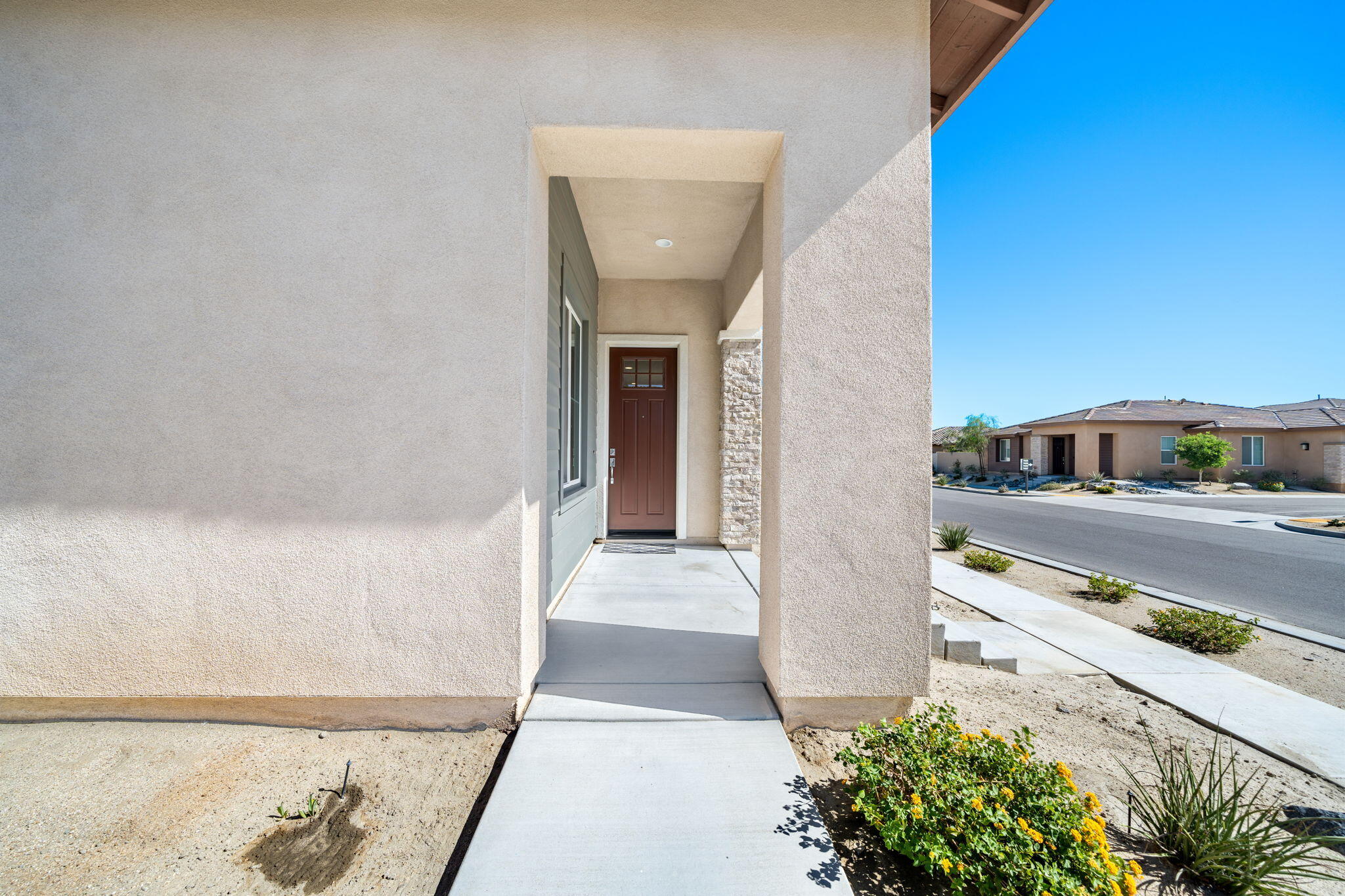 74338 Millennia Way Palm Desert, CA 92211 - Photo 4 of 33 a view of a street from a hallway