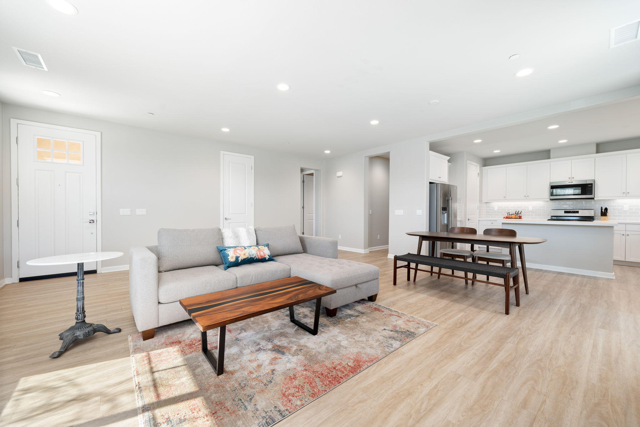 74338 Millennia Way Palm Desert, CA 92211 - Photo 8 of 33 a living room with furniture and a table