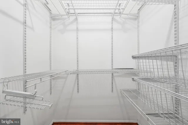 a view of a room with racks on the wall