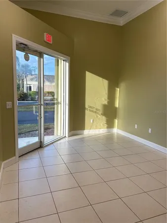 a view of an empty room and window