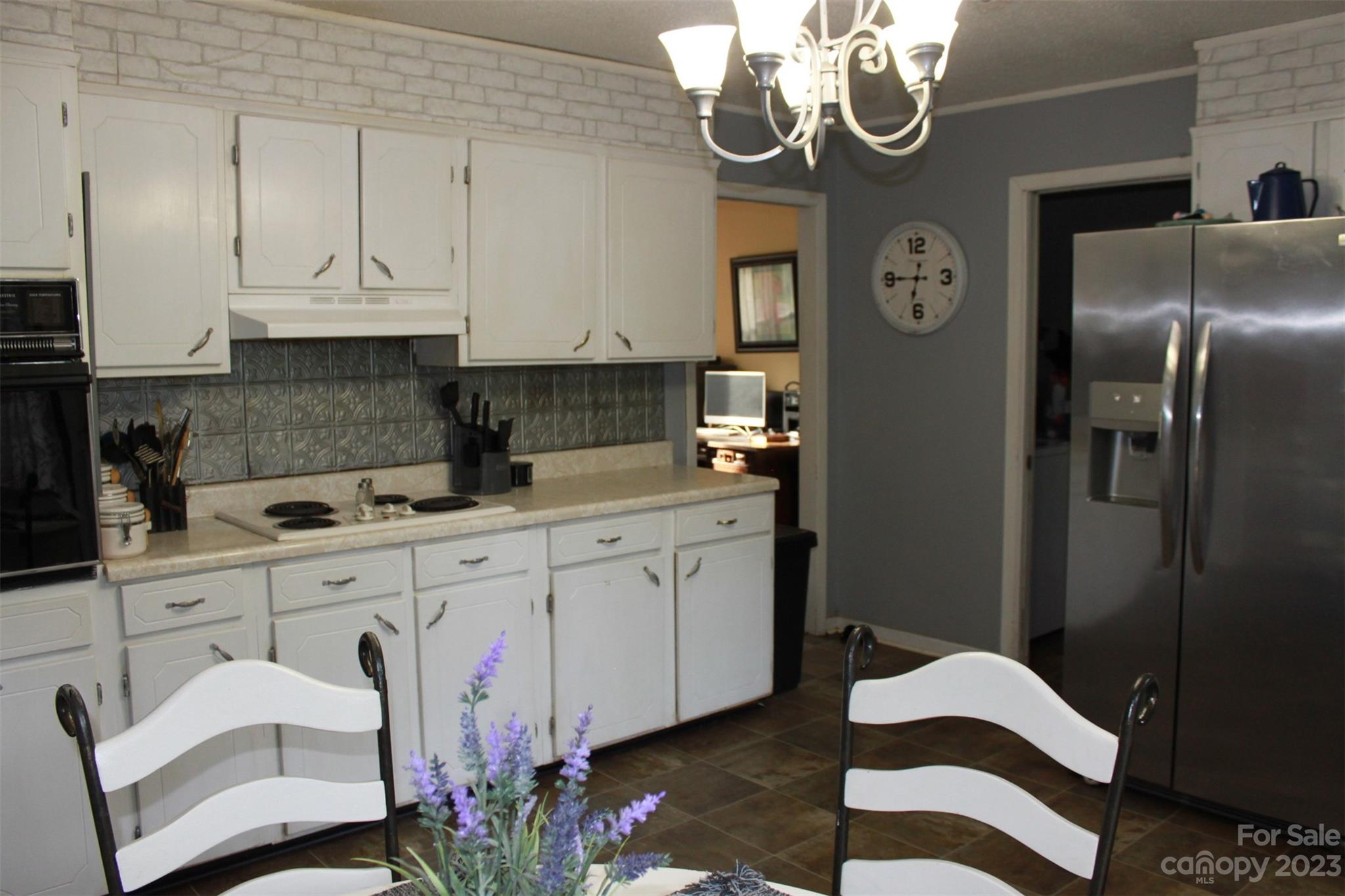 901 Coopers Gap Road Rutherfordton, NC 28139 - Photo 12 of 47 a kitchen with a sink and cabinets