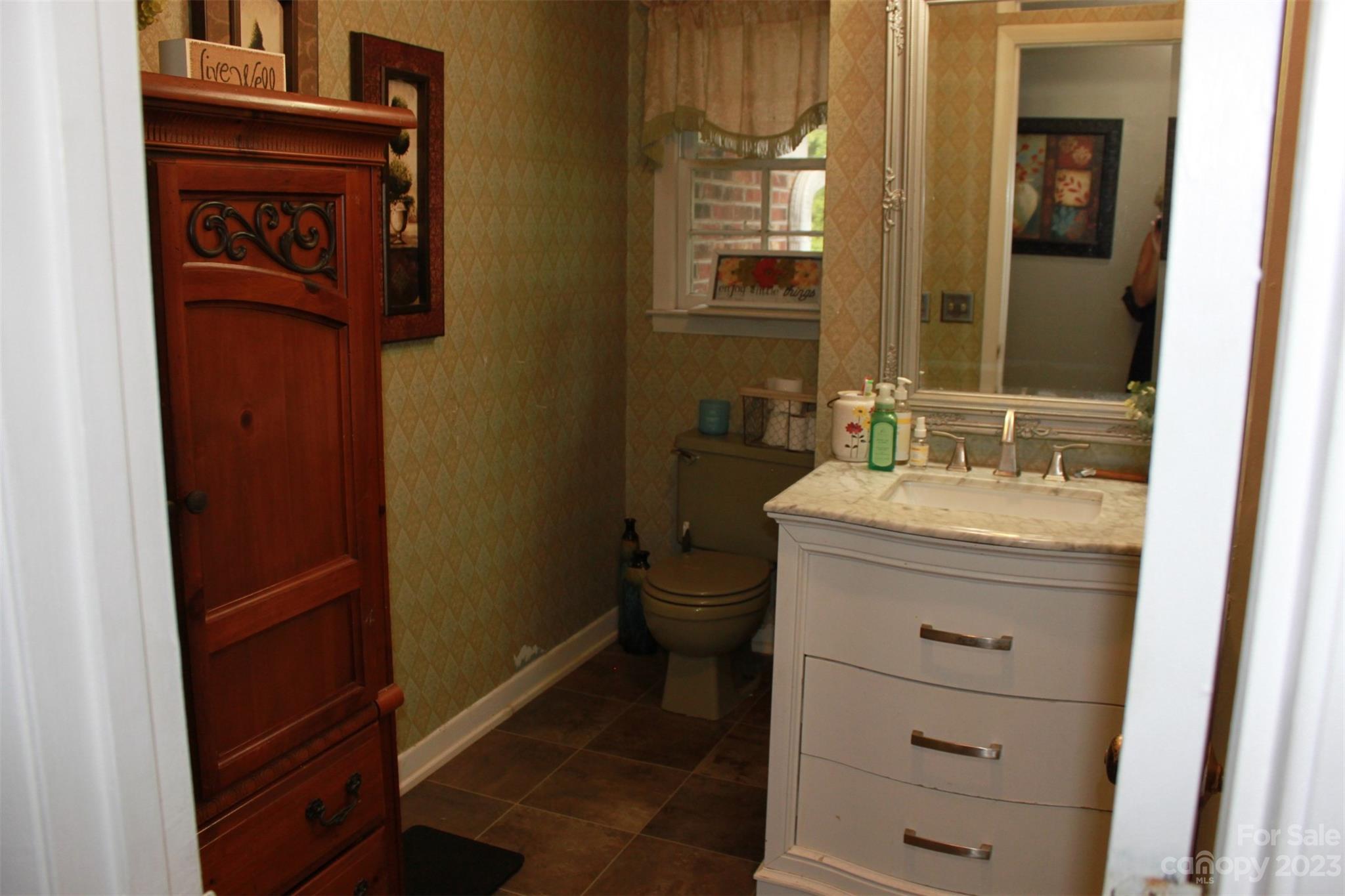 901 Coopers Gap Road Rutherfordton, NC 28139 - Photo 17 of 47 a bathroom with a sink a toilet and shower