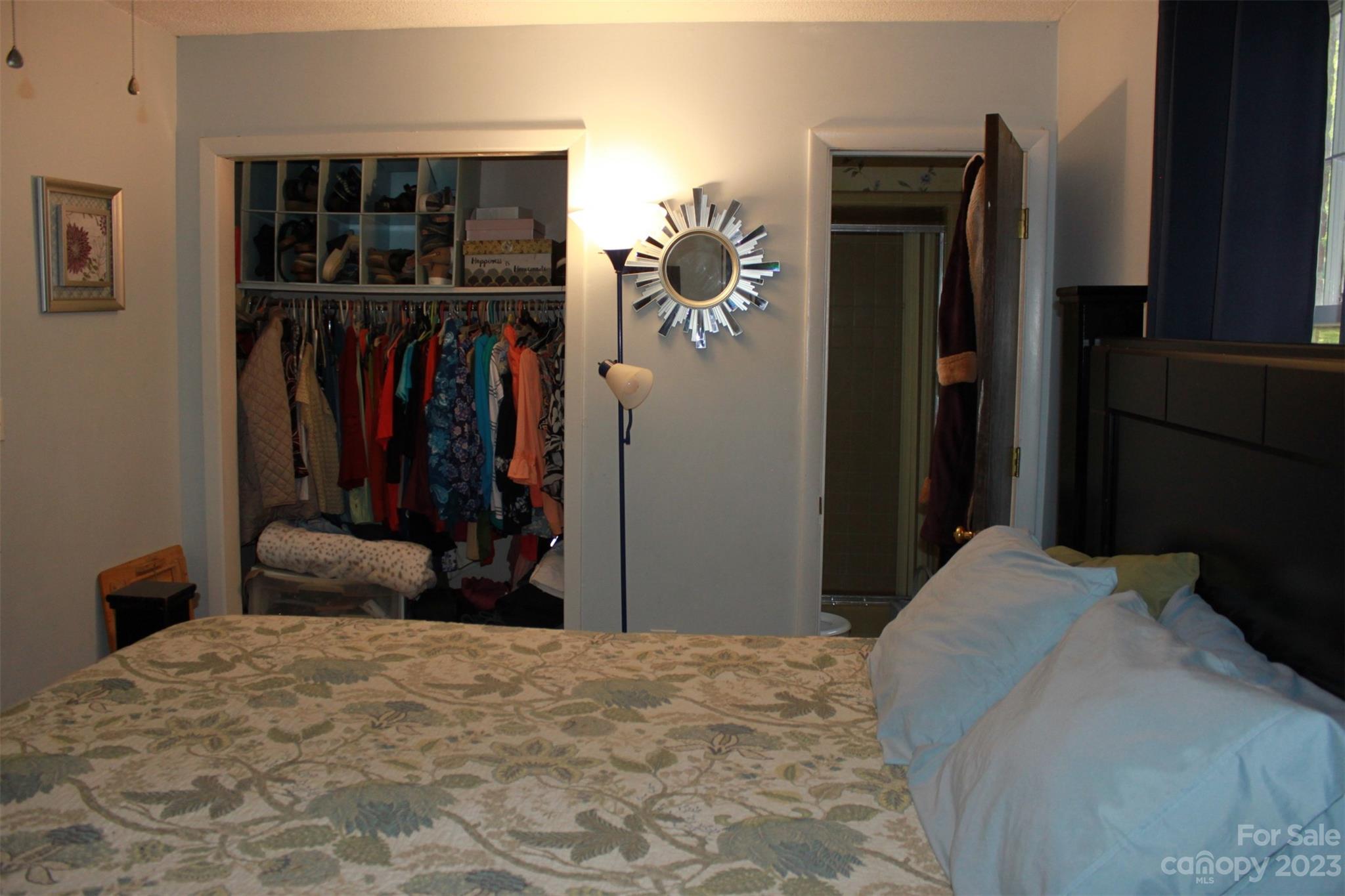901 Coopers Gap Road Rutherfordton, NC 28139 - Photo 21 of 47 a bedroom with a bed and a window