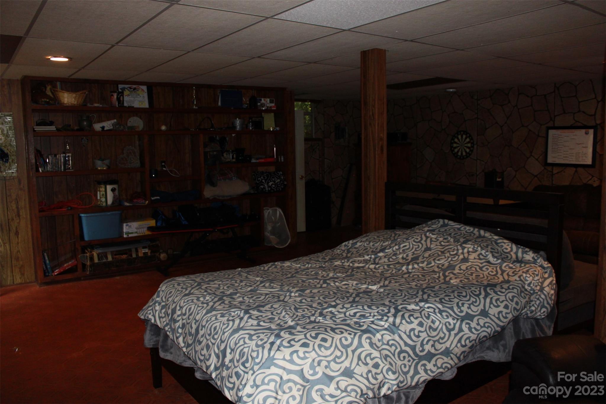 901 Coopers Gap Road Rutherfordton, NC 28139 - Photo 35 of 47 a bed sitting in a room next to a window