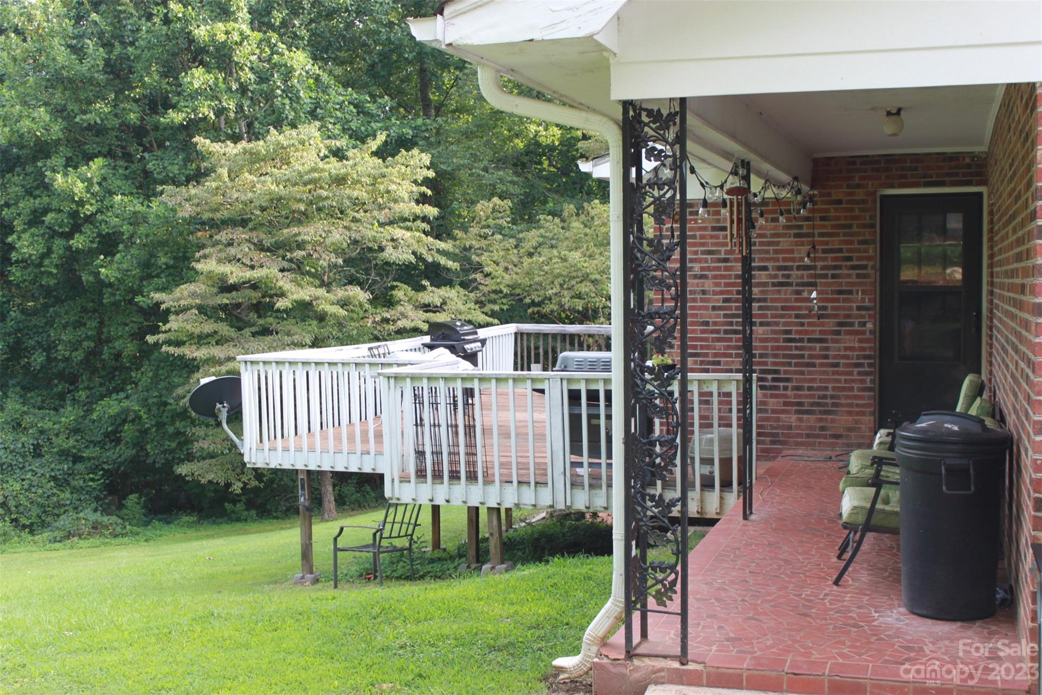 901 Coopers Gap Road Rutherfordton, NC 28139 - Photo 42 of 47 a view of a deck with a table and chair swing
