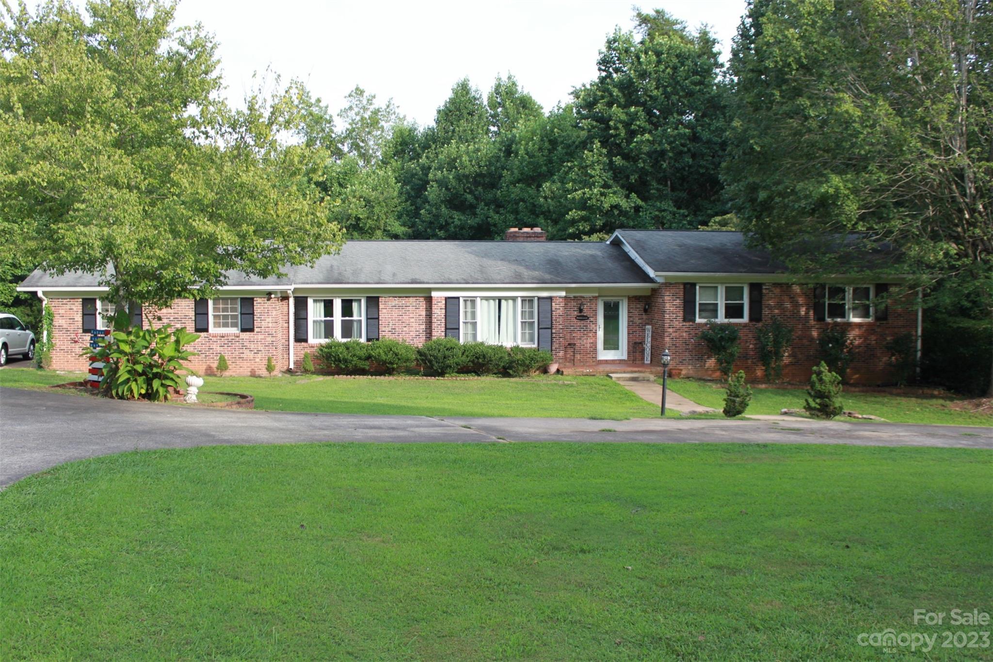 901 Coopers Gap Road Rutherfordton, NC 28139 - Photo 44 of 47 a front view of a house with a yard