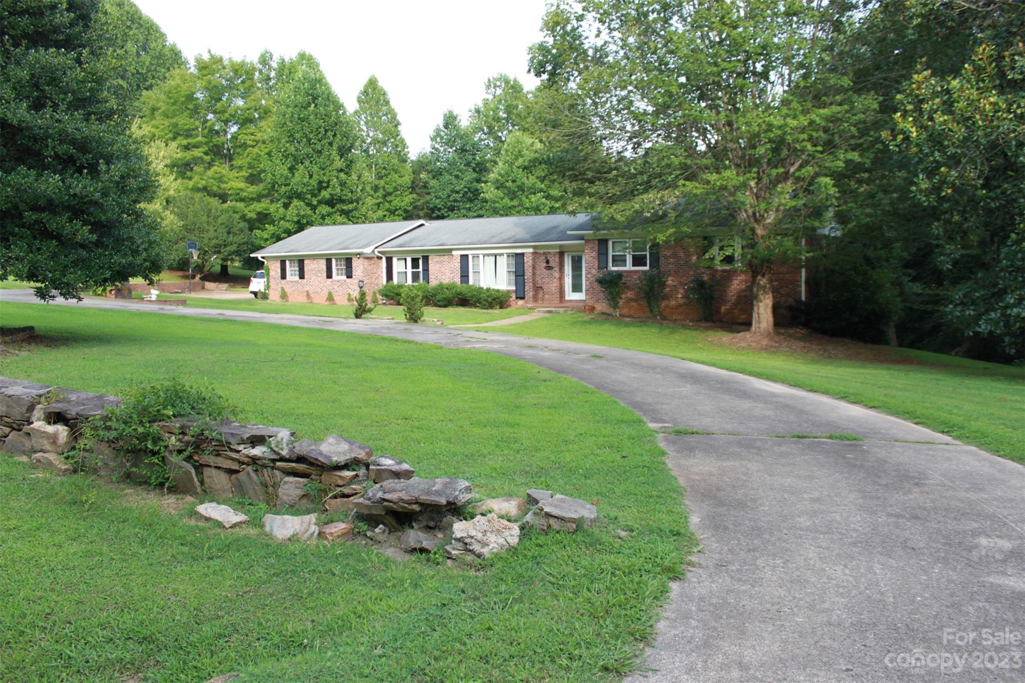 901 Coopers Gap Road Rutherfordton, NC 28139 - Photo 46 of 47 a front view of a house with garden