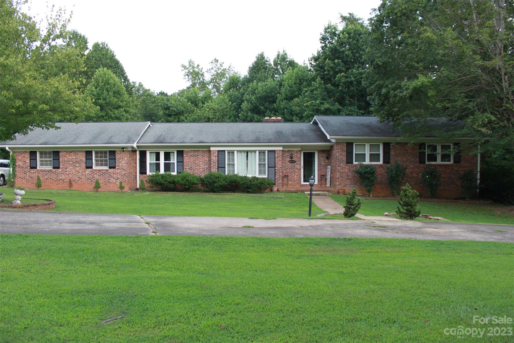 901 Coopers Gap Road Rutherfordton, NC 28139 - Photo 47 of 47 a view of big yard in front of a house with a yard