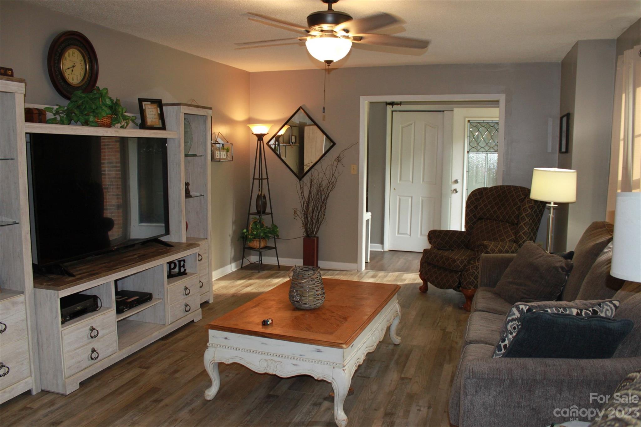 901 Coopers Gap Road Rutherfordton, NC 28139 - Photo 5 of 47 a living room with furniture and a flat screen tv