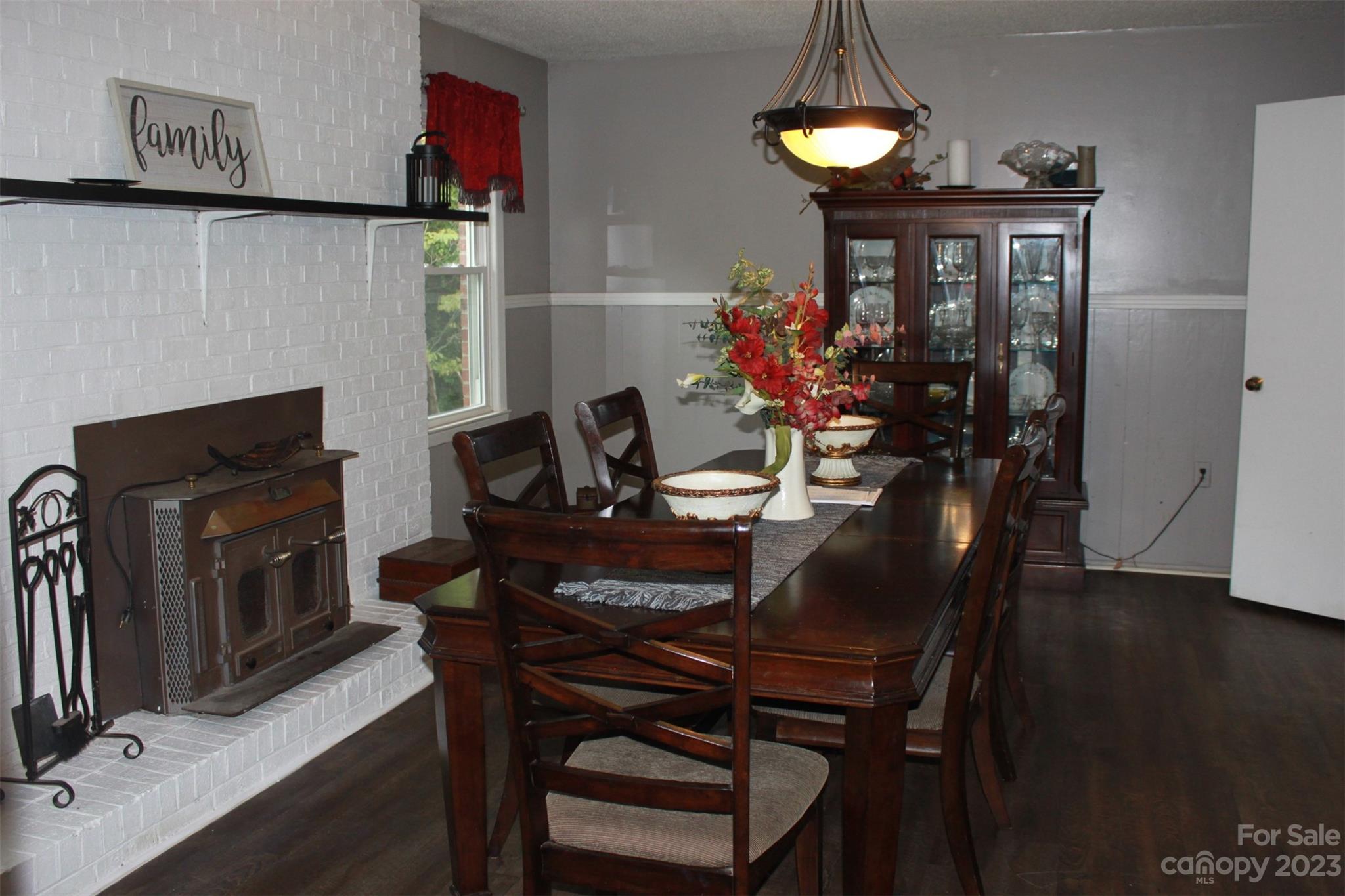901 Coopers Gap Road Rutherfordton, NC 28139 - Photo 6 of 47 a view of a dining room with furniture and wooden floor