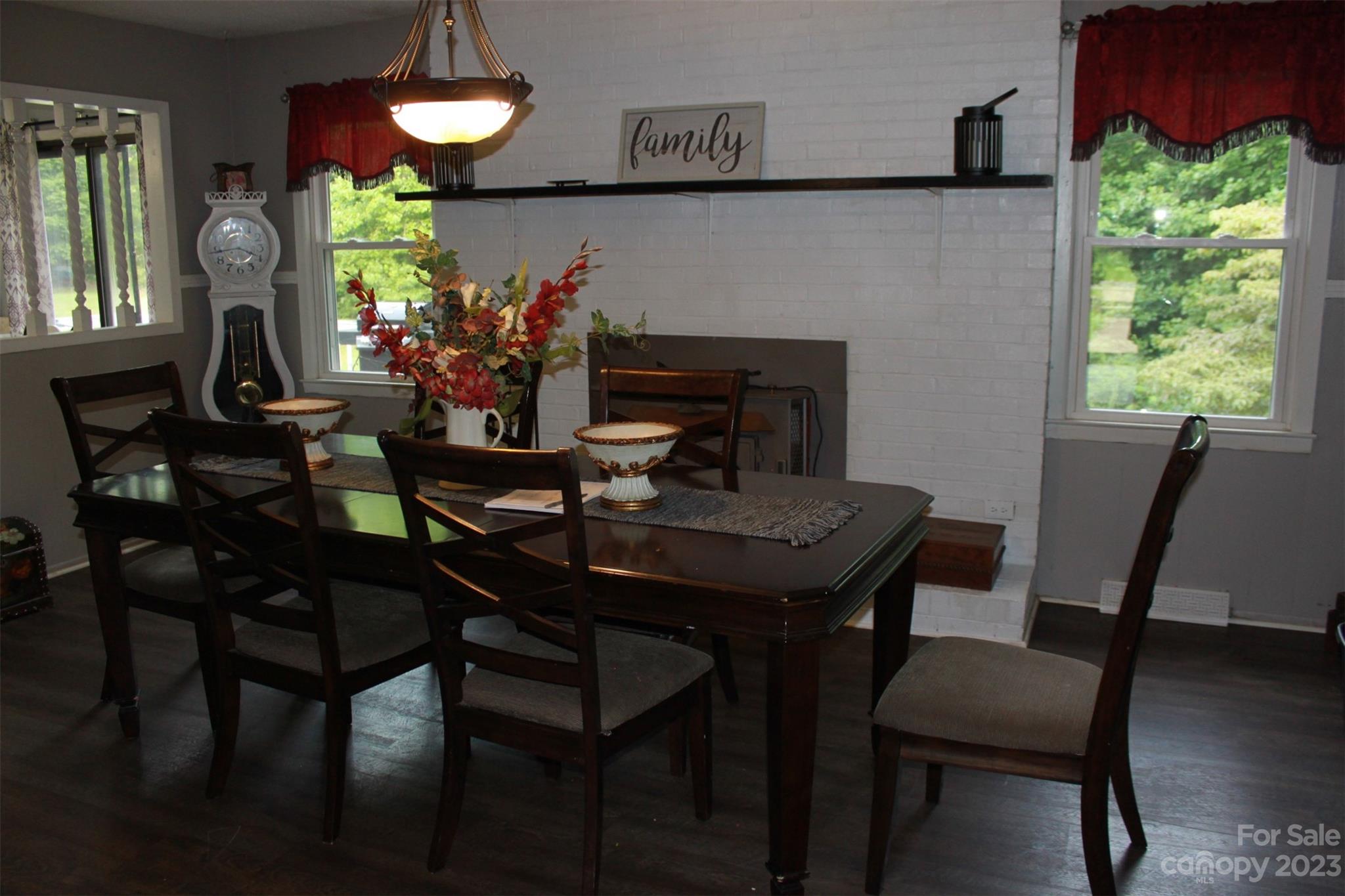 901 Coopers Gap Road Rutherfordton, NC 28139 - Photo 7 of 47 a view of a dining room with furniture and a potted plant