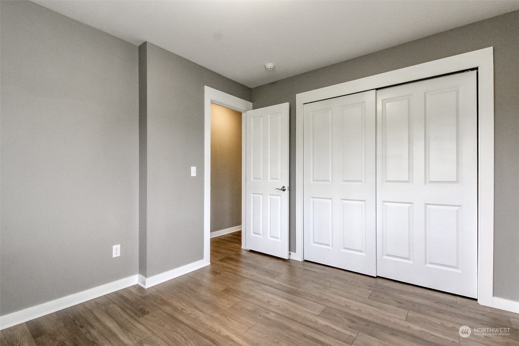 3924 Gay Road East Tacoma, WA 98443 - Photo 18 of 38 a view of an empty room and wooden floor & entryway