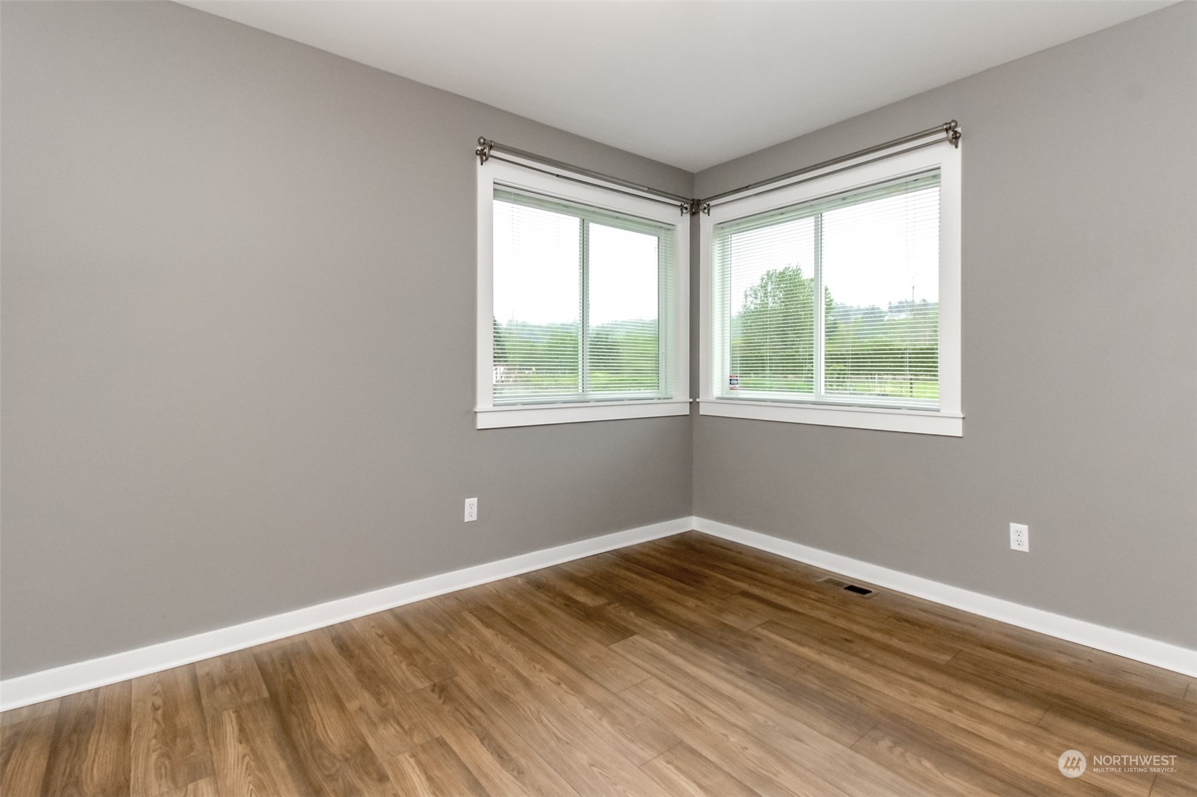 3924 Gay Road East Tacoma, WA 98443 - Photo 19 of 38 a view of a room with wooden floor and a window