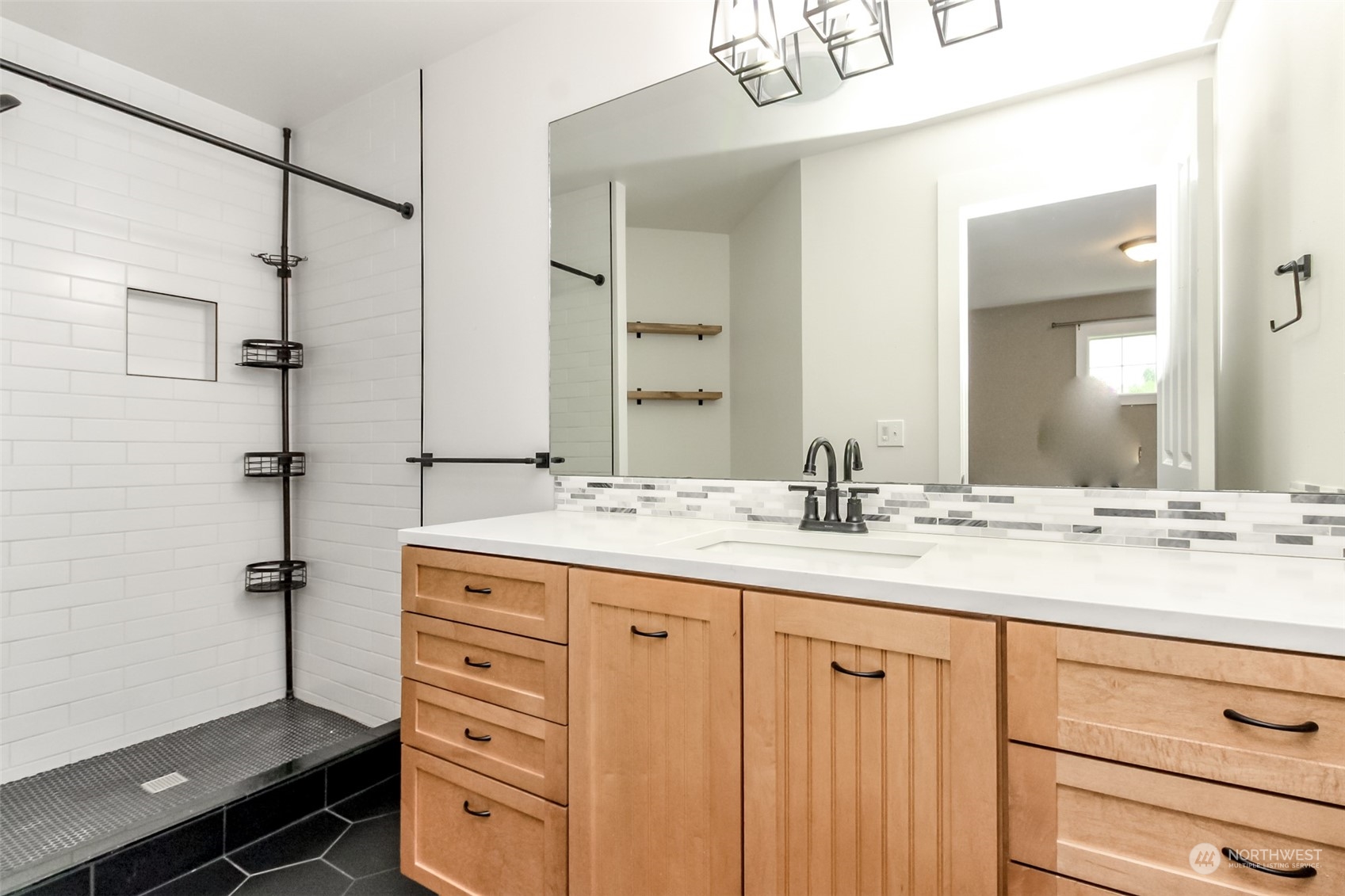 3924 Gay Road East Tacoma, WA 98443 - Photo 30 of 38 a bathroom with a granite countertop sink vanity mirror and shower